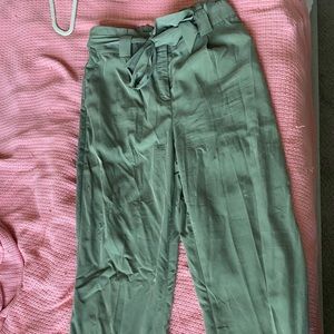 High-waisted olive green paper bag ankle pants. Size M. Tie waist